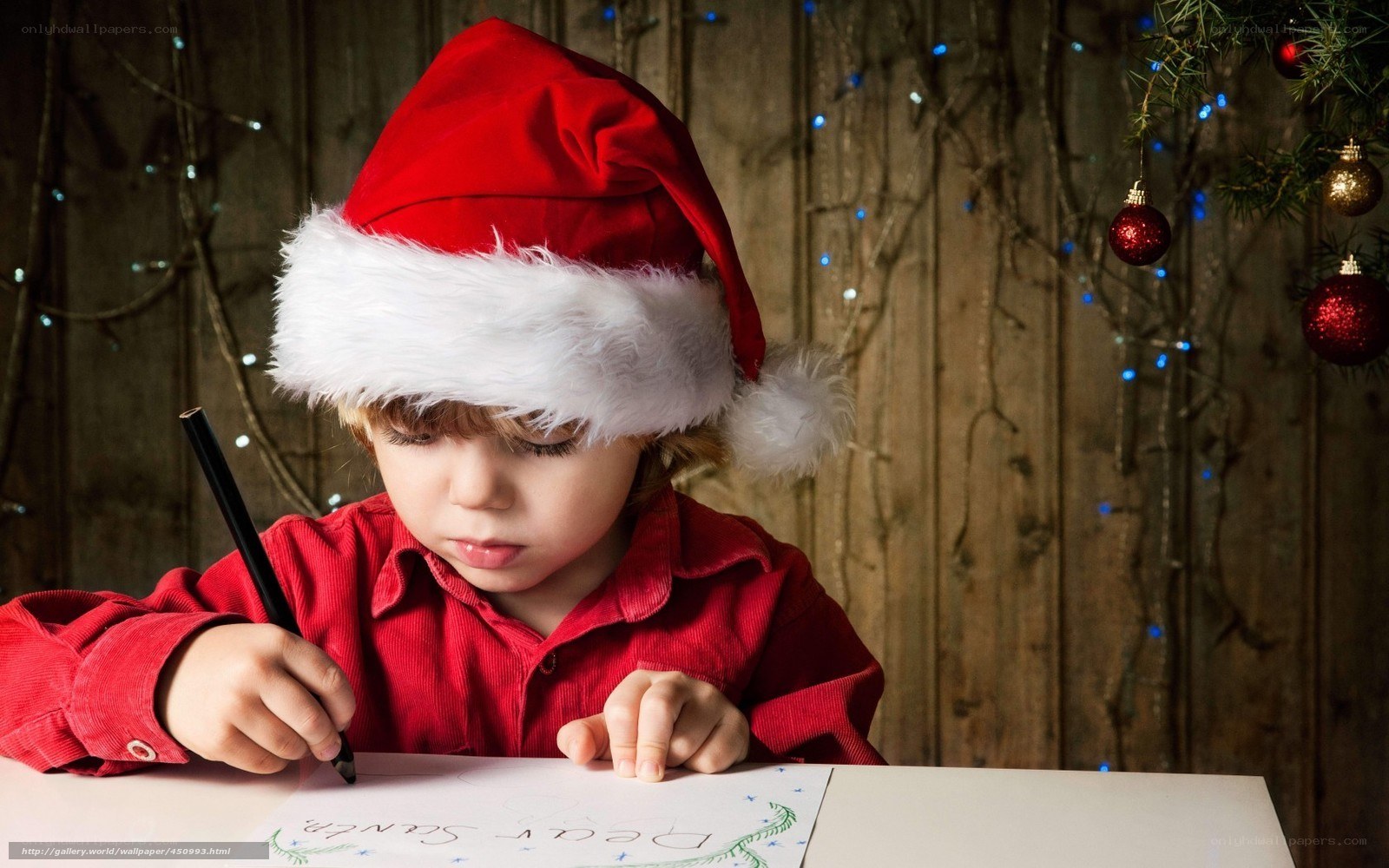 child writing letter to santa