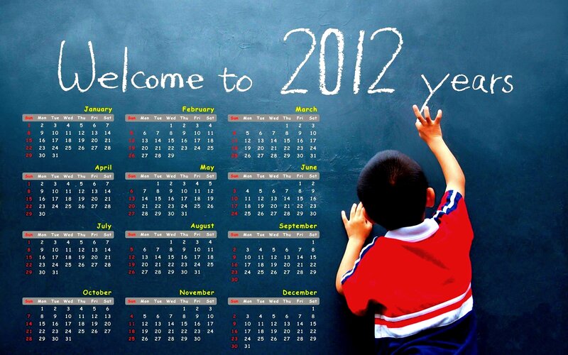 Child Writing on Chalkboard — Blue