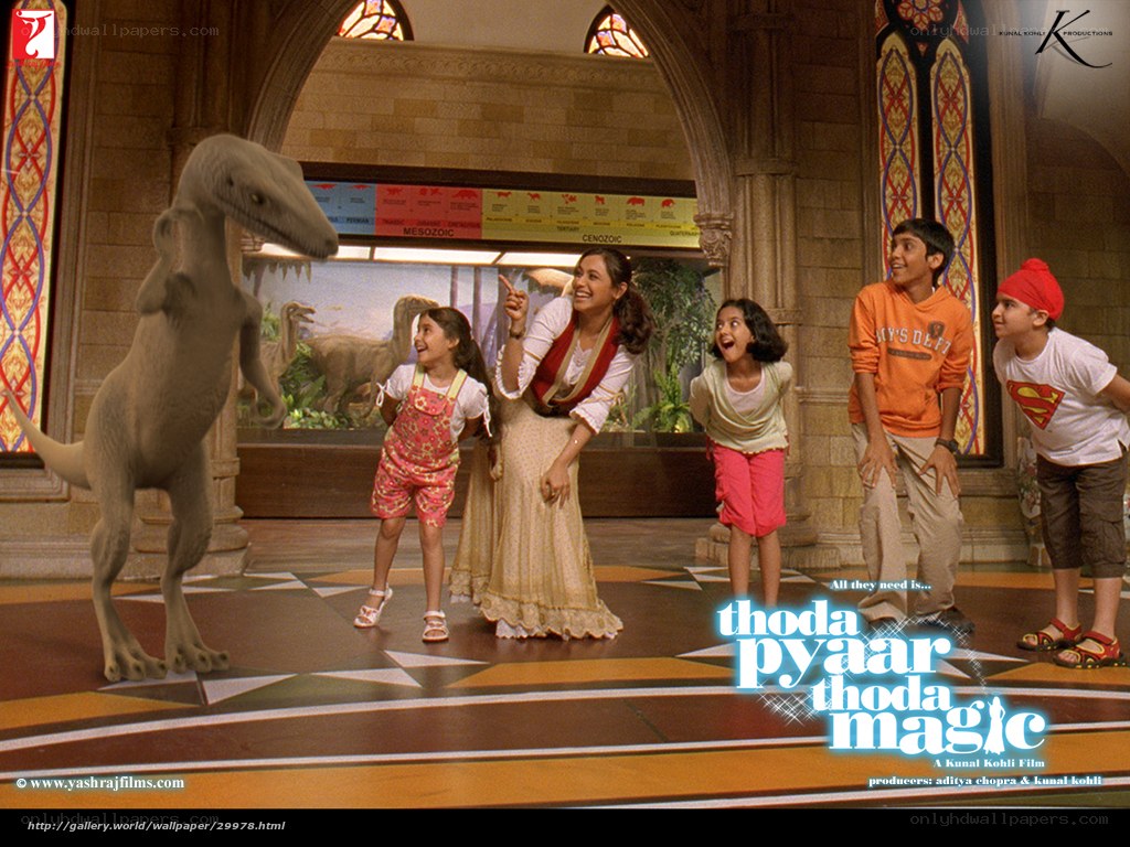 Children and dinosaur in museum