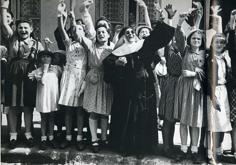 Children and nun celebrating