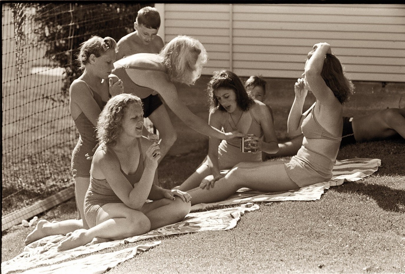 Children at a backyard pool party