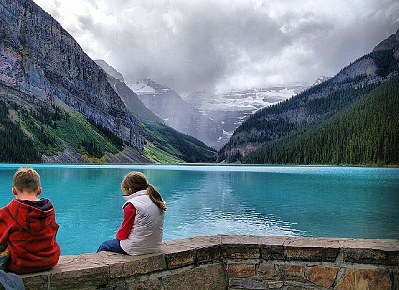 Children at a mountain lake
