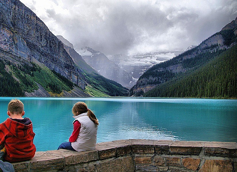 Children at a mountain lake