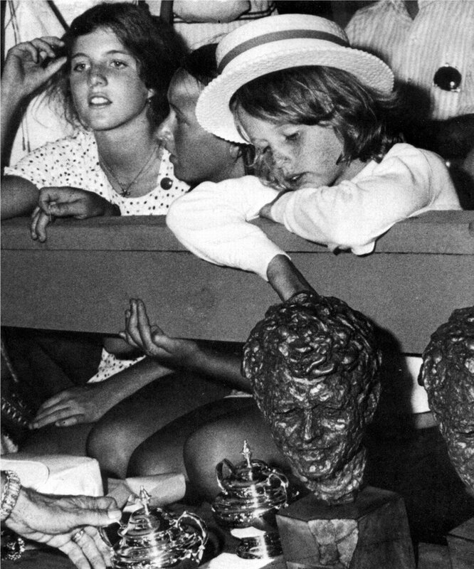 Children at a trophy display