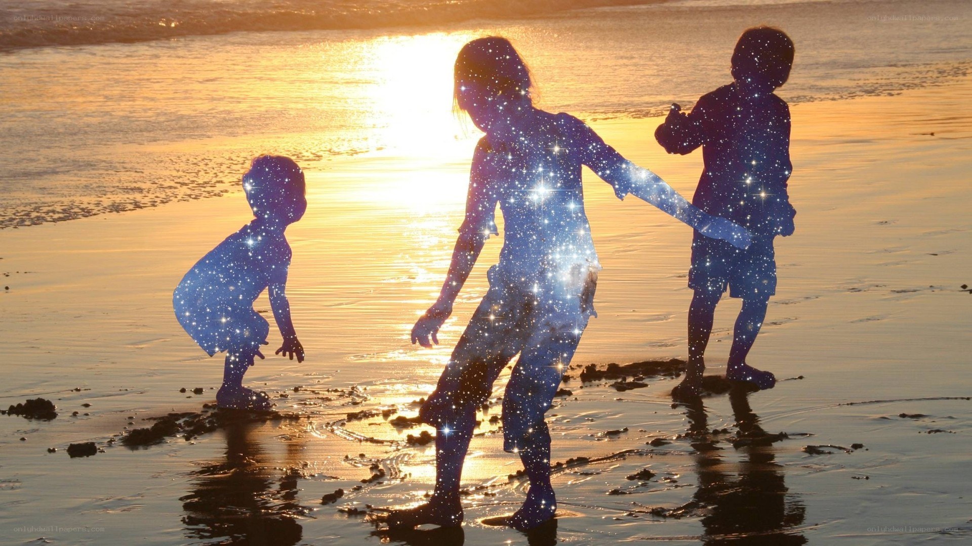 children at sunset on beach