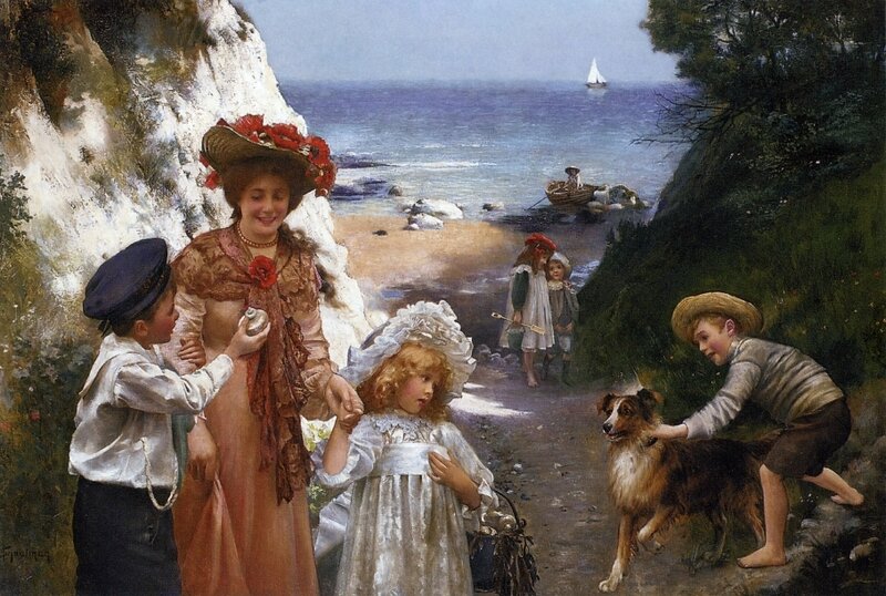 Children at the seaside with a woman
