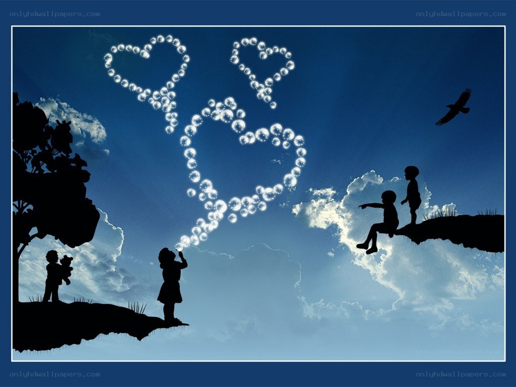 Children blowing heart-shaped bubbles