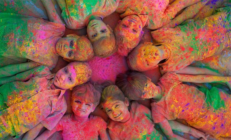 Children Covered in Colored Powder