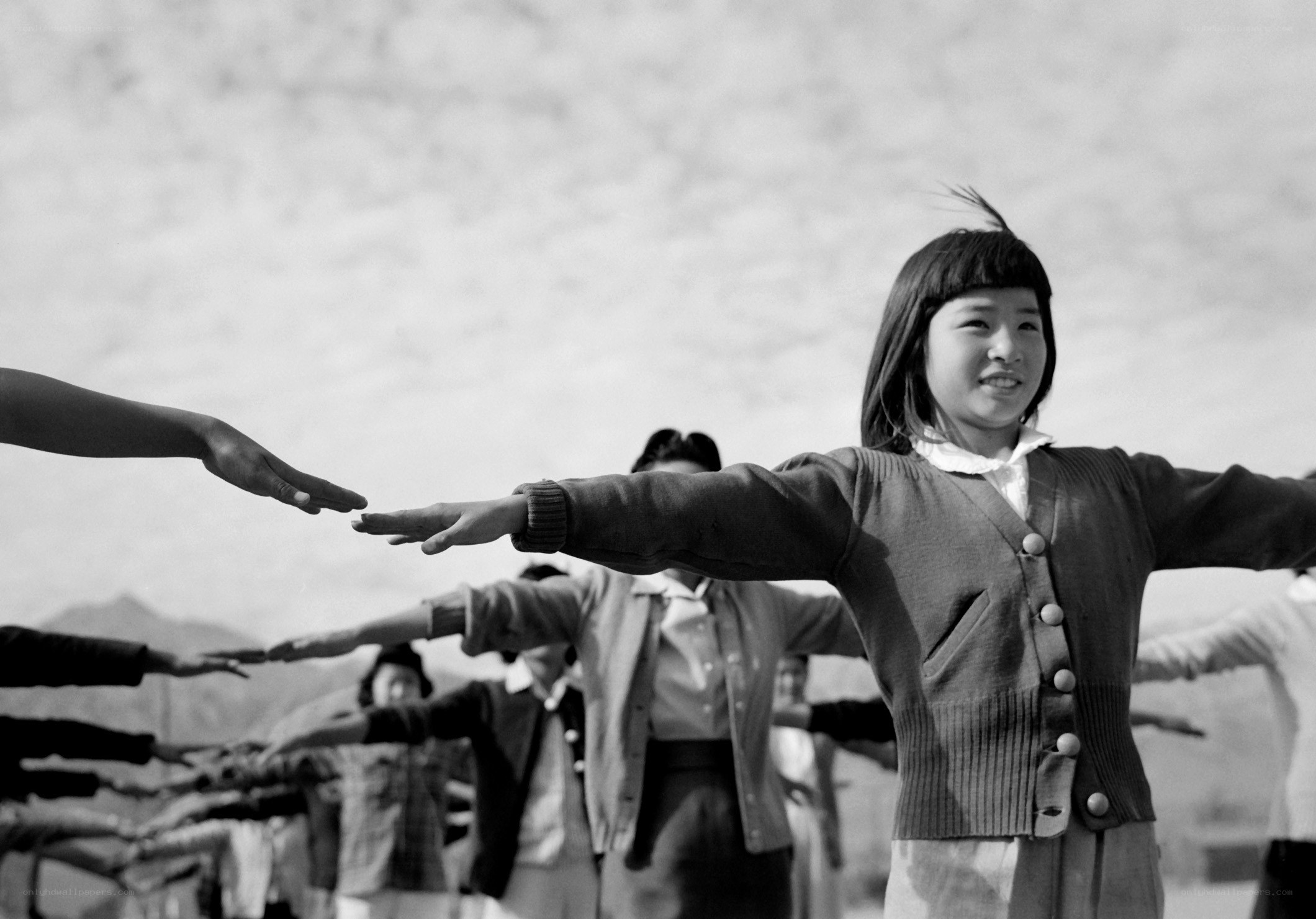 Children doing exercises outdoors