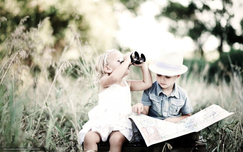 Children exploring with binoculars