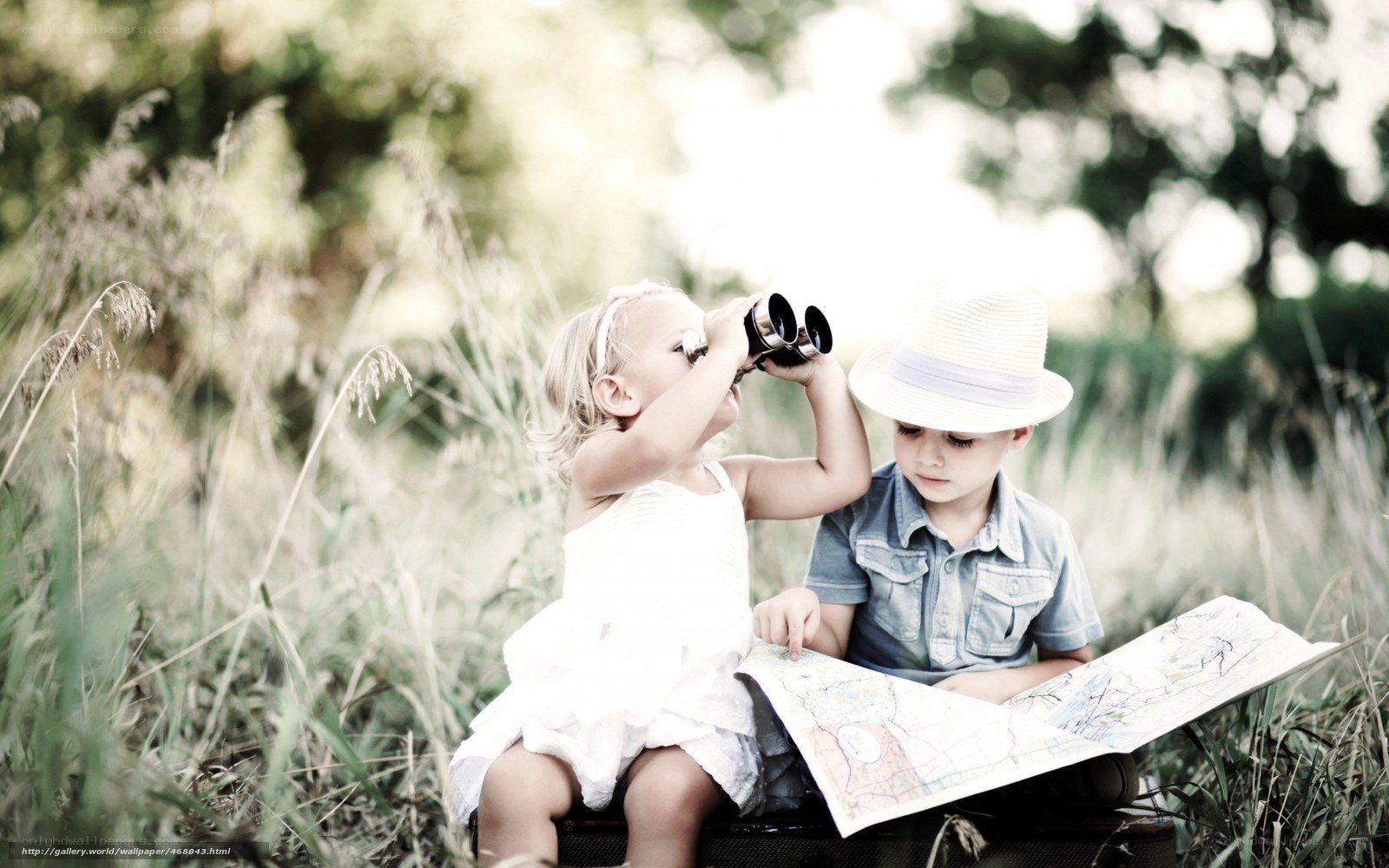 Children exploring with binoculars