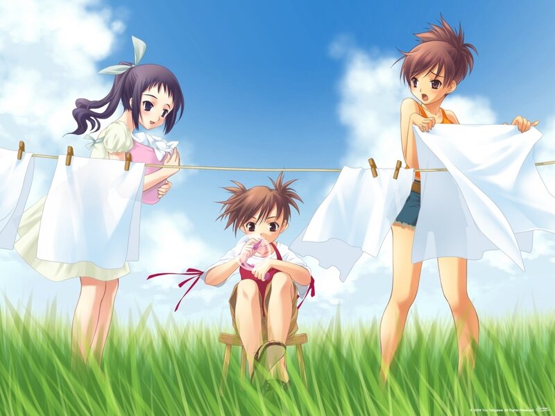 Children hanging laundry on a clothesline
