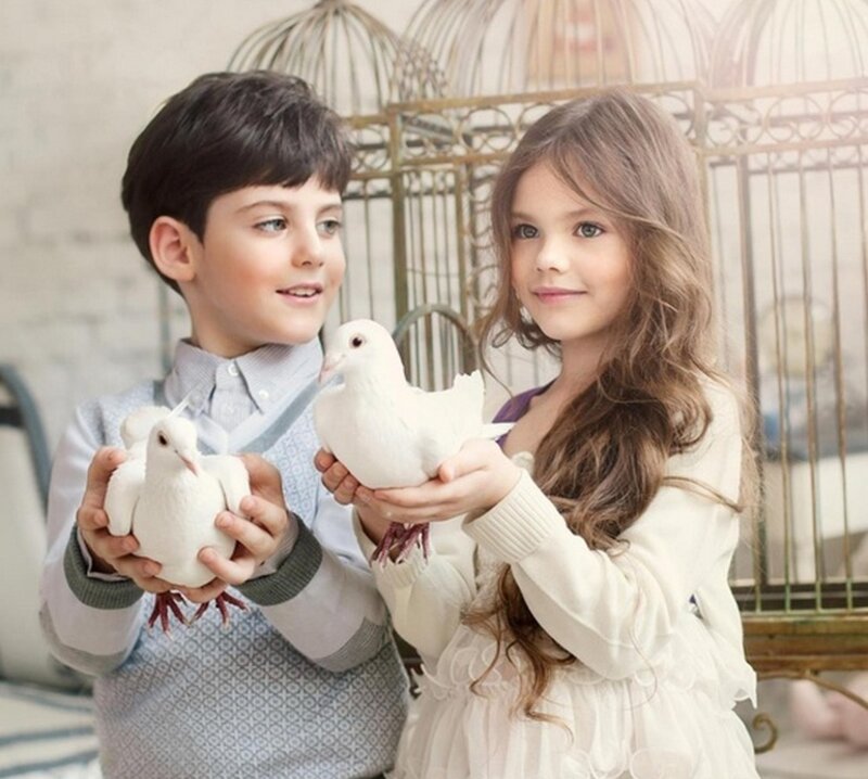Children Holding Doves