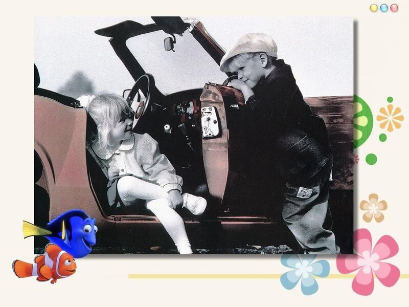 children in a car with fish