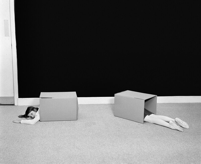 Children in cardboard boxes