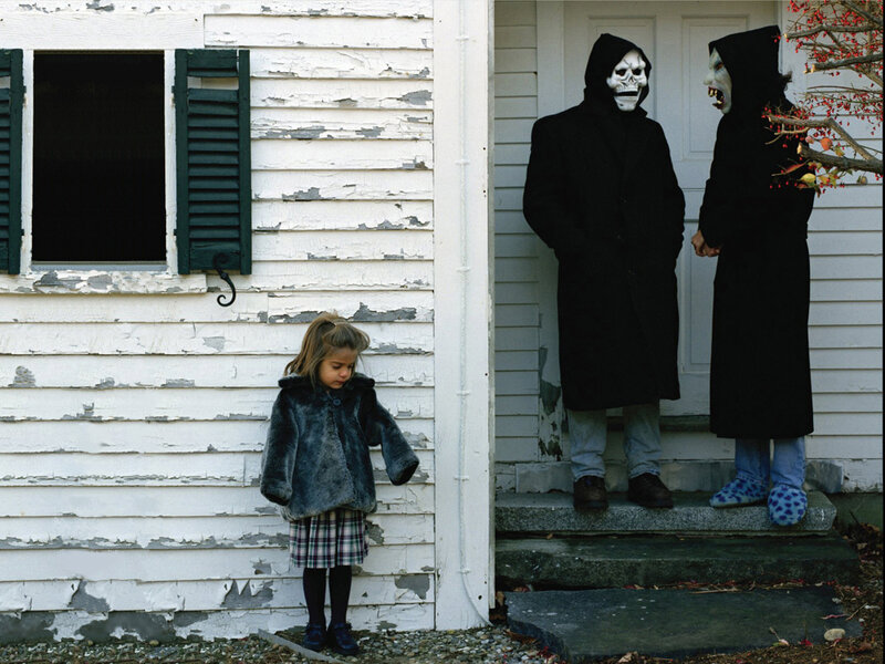 Children in costumes on porch