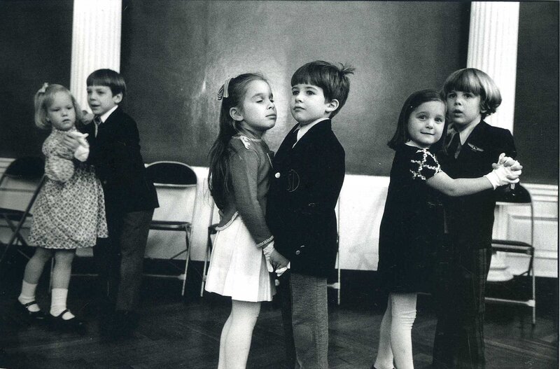 Children in formal wear at a dance