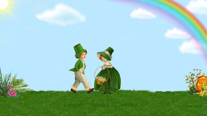 children in green on a rainbow day