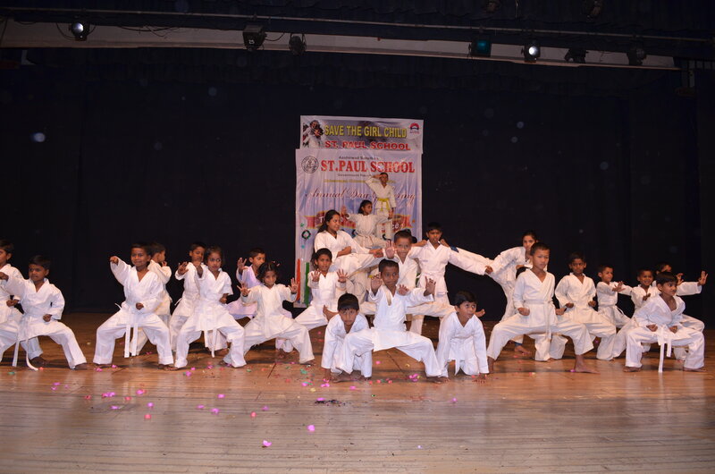Children in Karate Uniforms — White