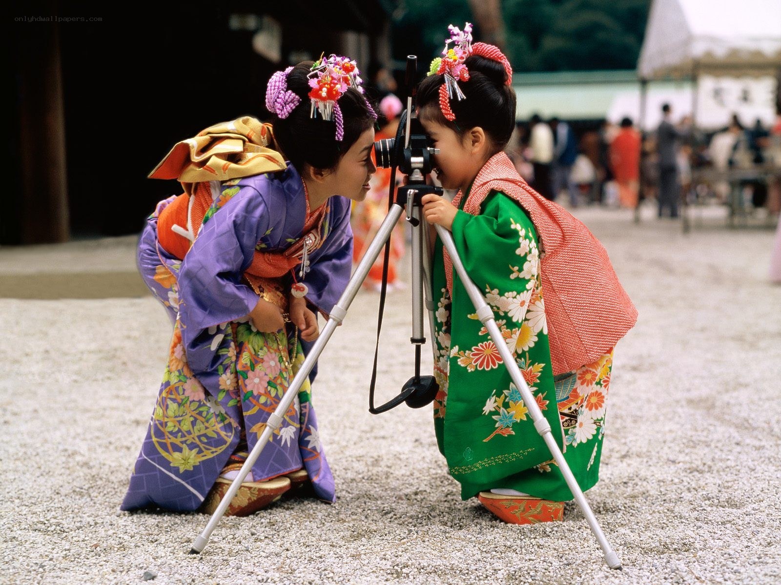 Children in kimonos with camera