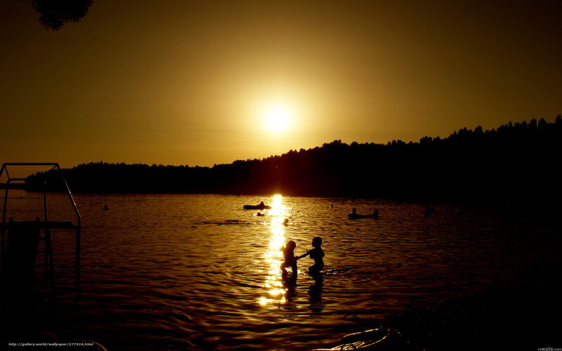 Children in Lake at Sunset