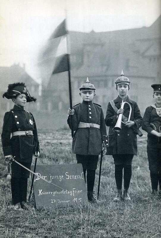 Children in military uniforms
