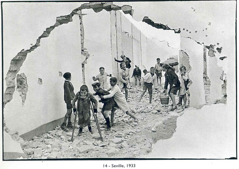 Children in rubble after Seville earthquake
