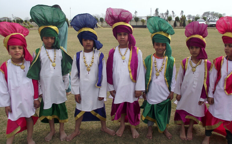 Children in Traditional Attire — White