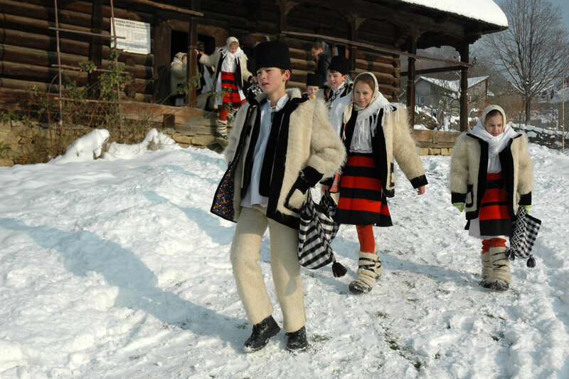 Children in Traditional Clothing — White