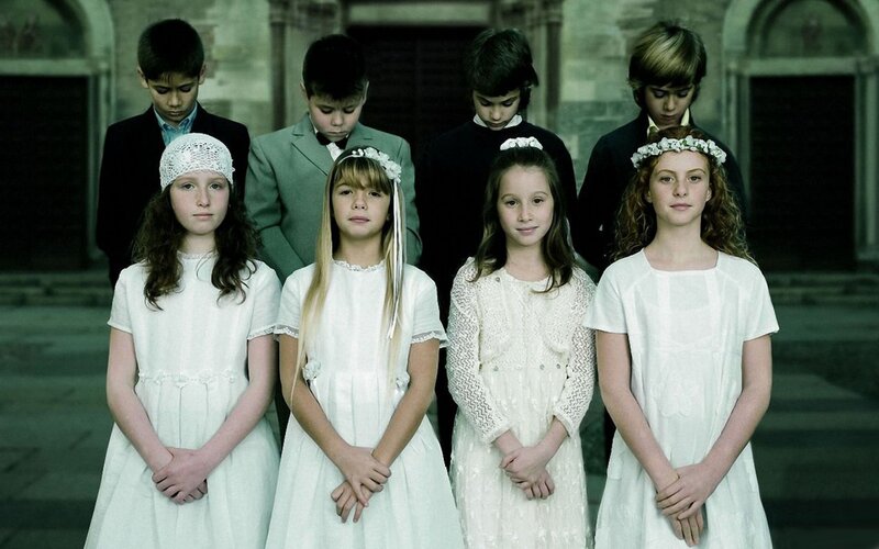 children in white dresses and suits