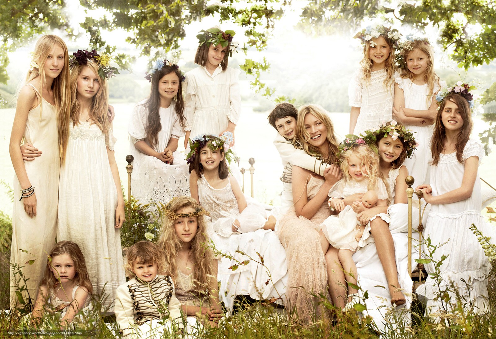 Children in white dresses with flower crowns