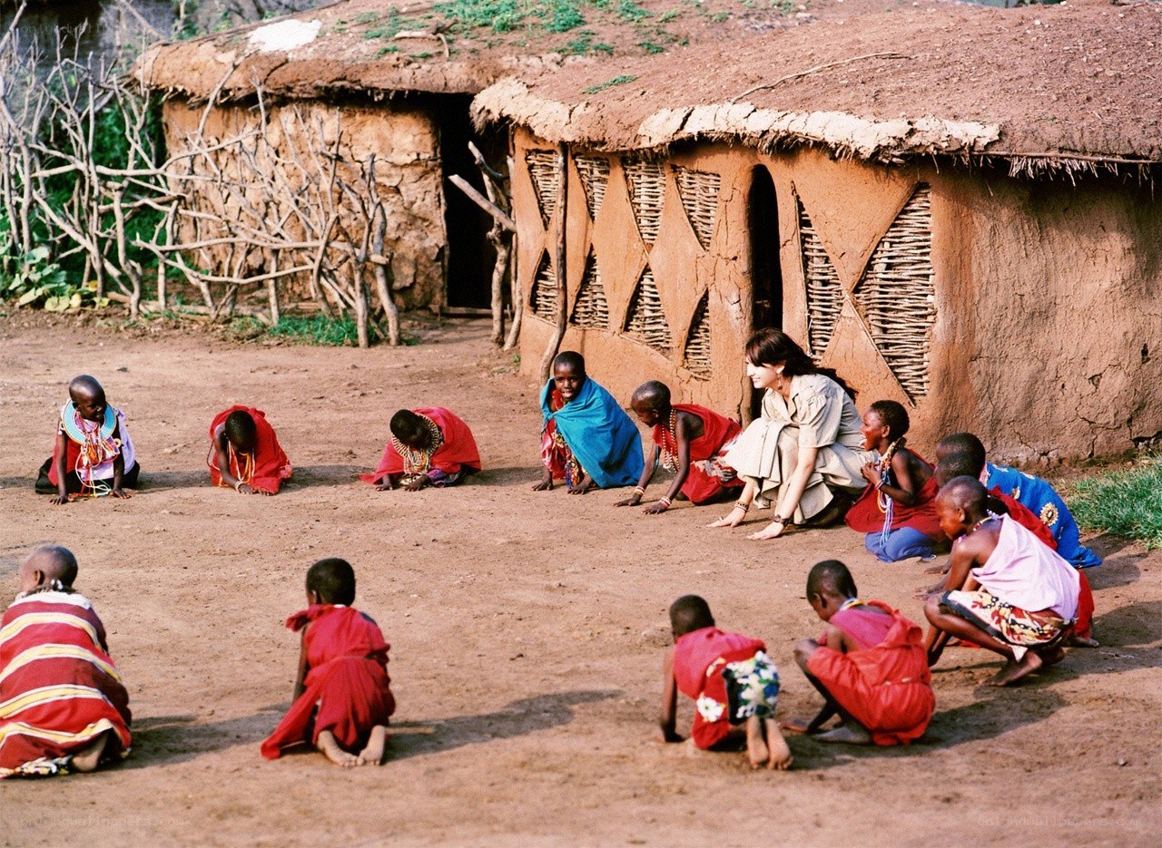 Children learning in a village
