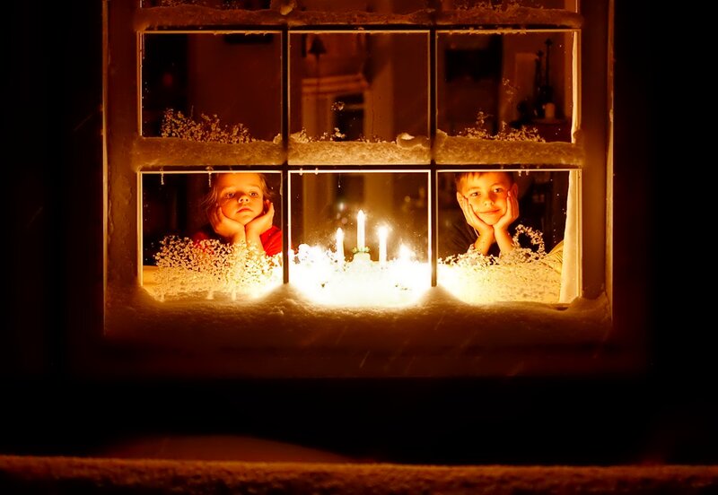 Children Looking Through Window