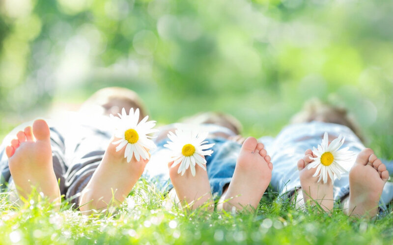 Children Lying on Grass — Green, Serene