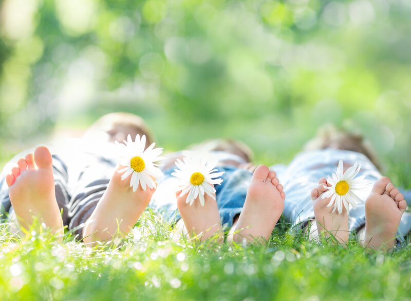 Children Lying on Grass — Green