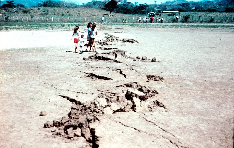 Children near cracked ground