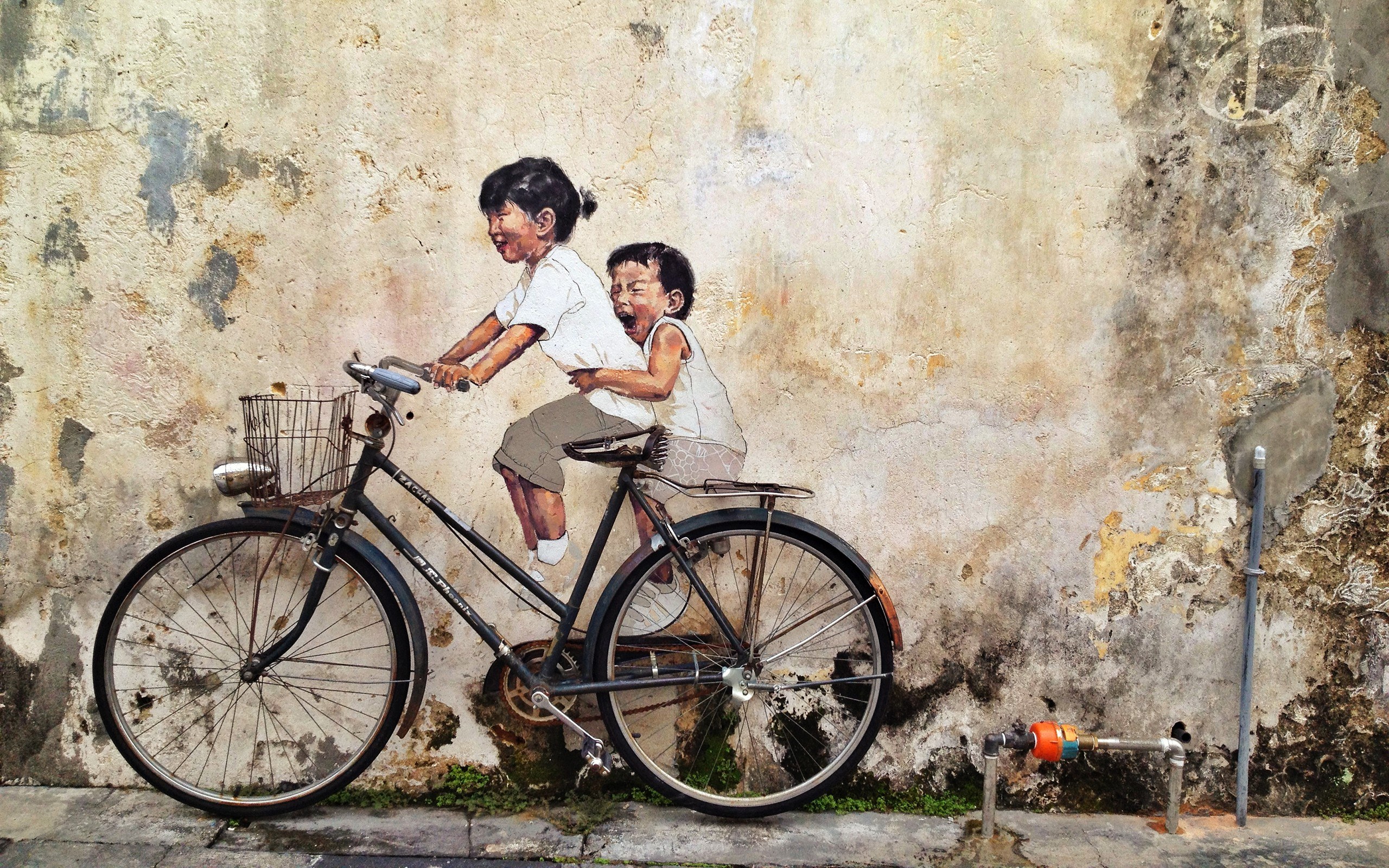 Children on a bicycle mural