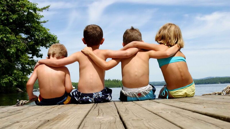 children on a dock