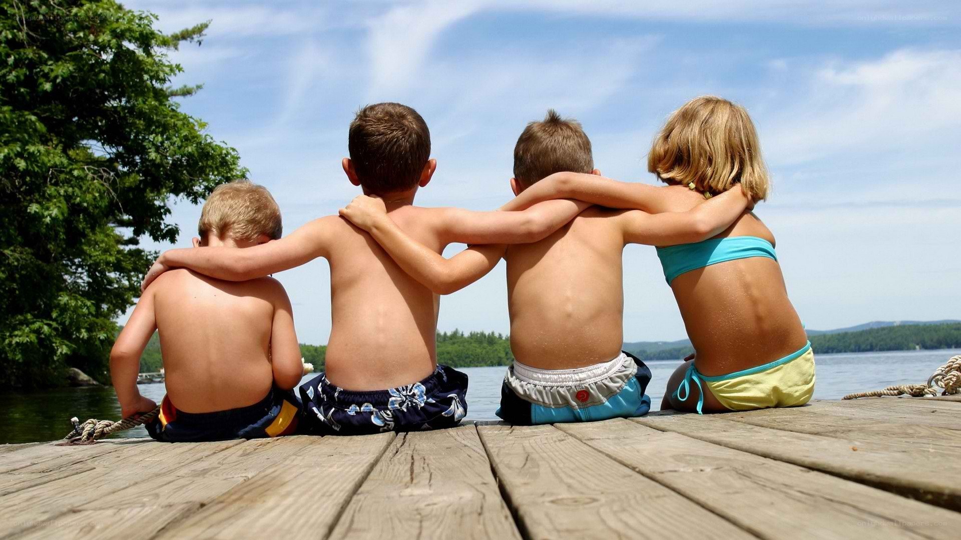 children on a dock