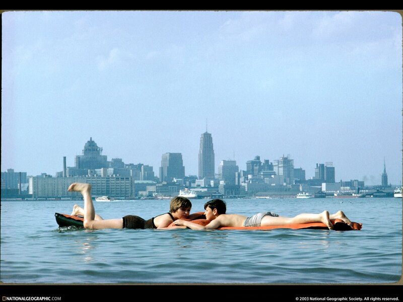 Children on a float in the harbor