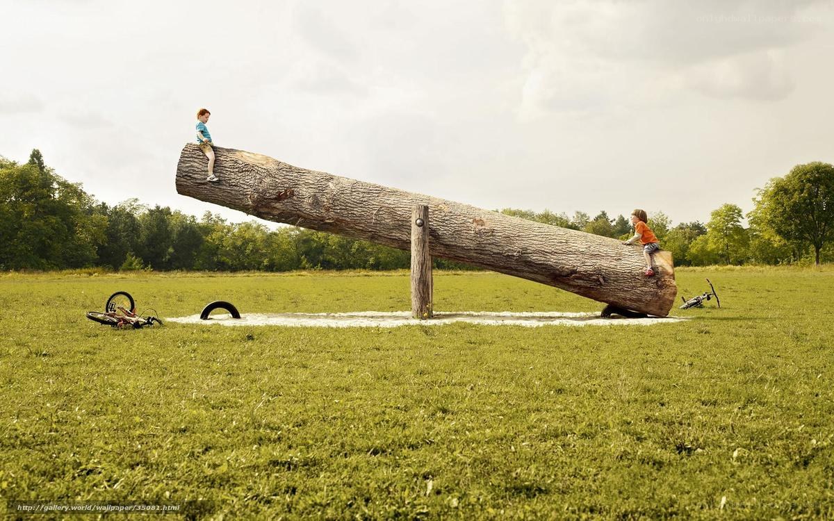Children on a giant seesaw