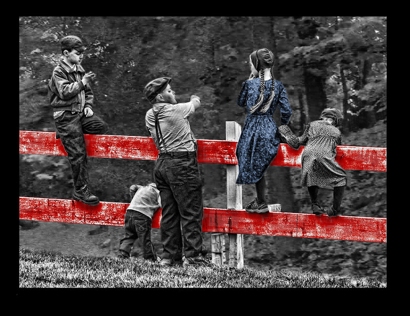 children on a red fence