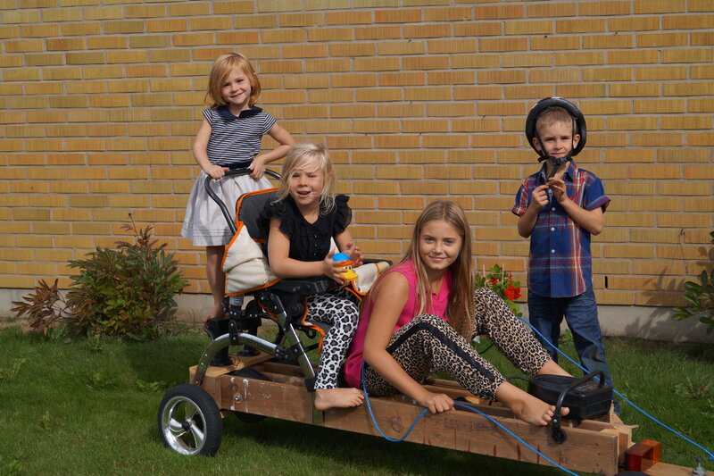Children on a Wooden Cart
