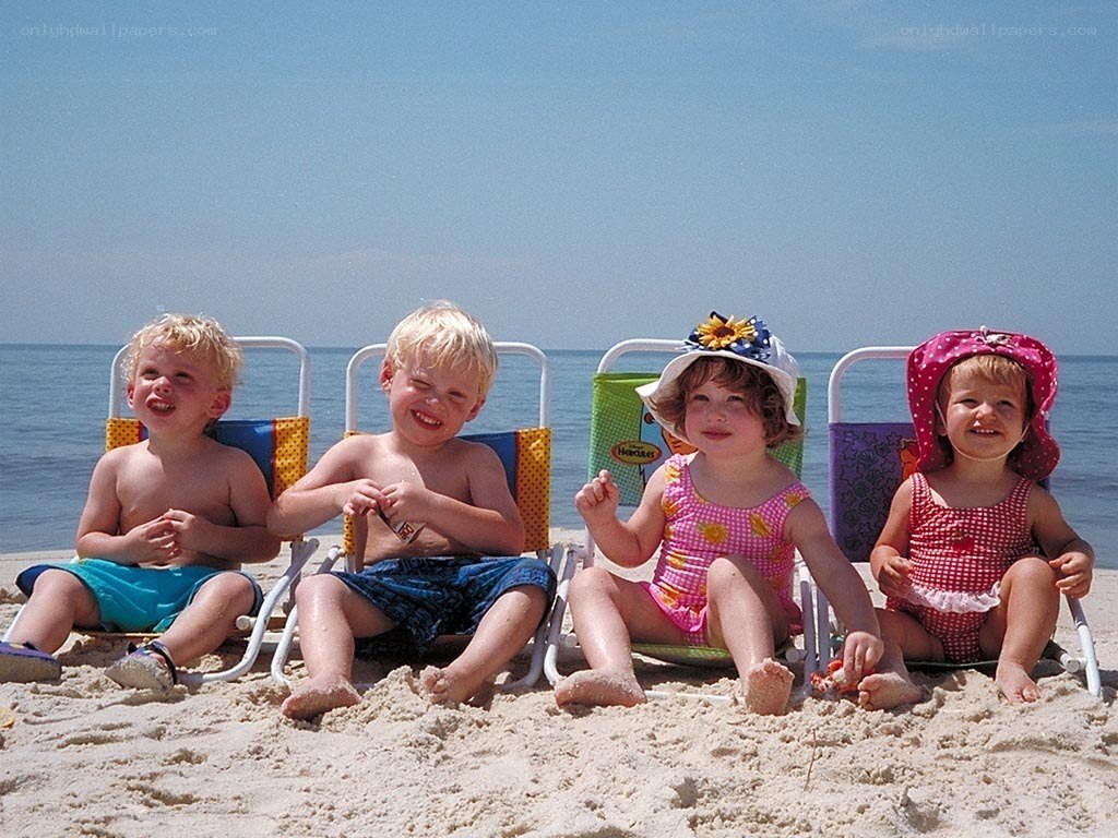 Children on beach chairs