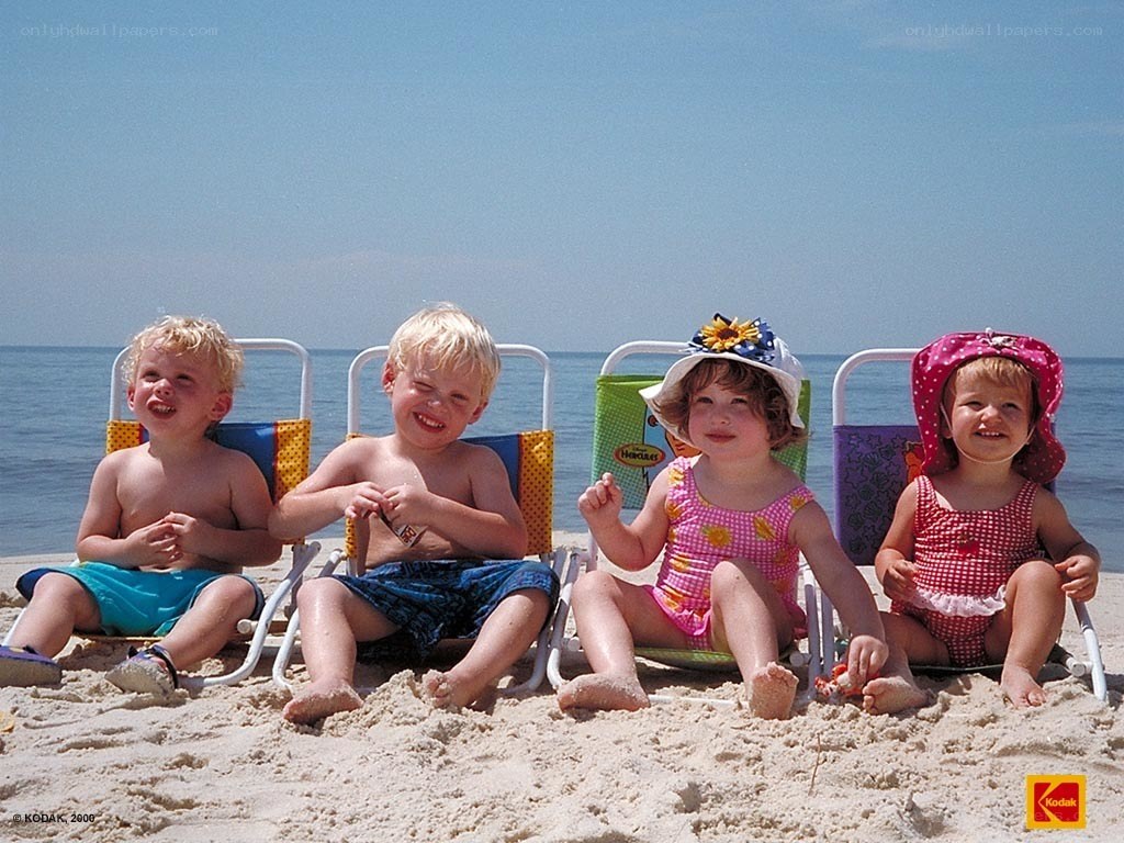 Children on beach chairs
