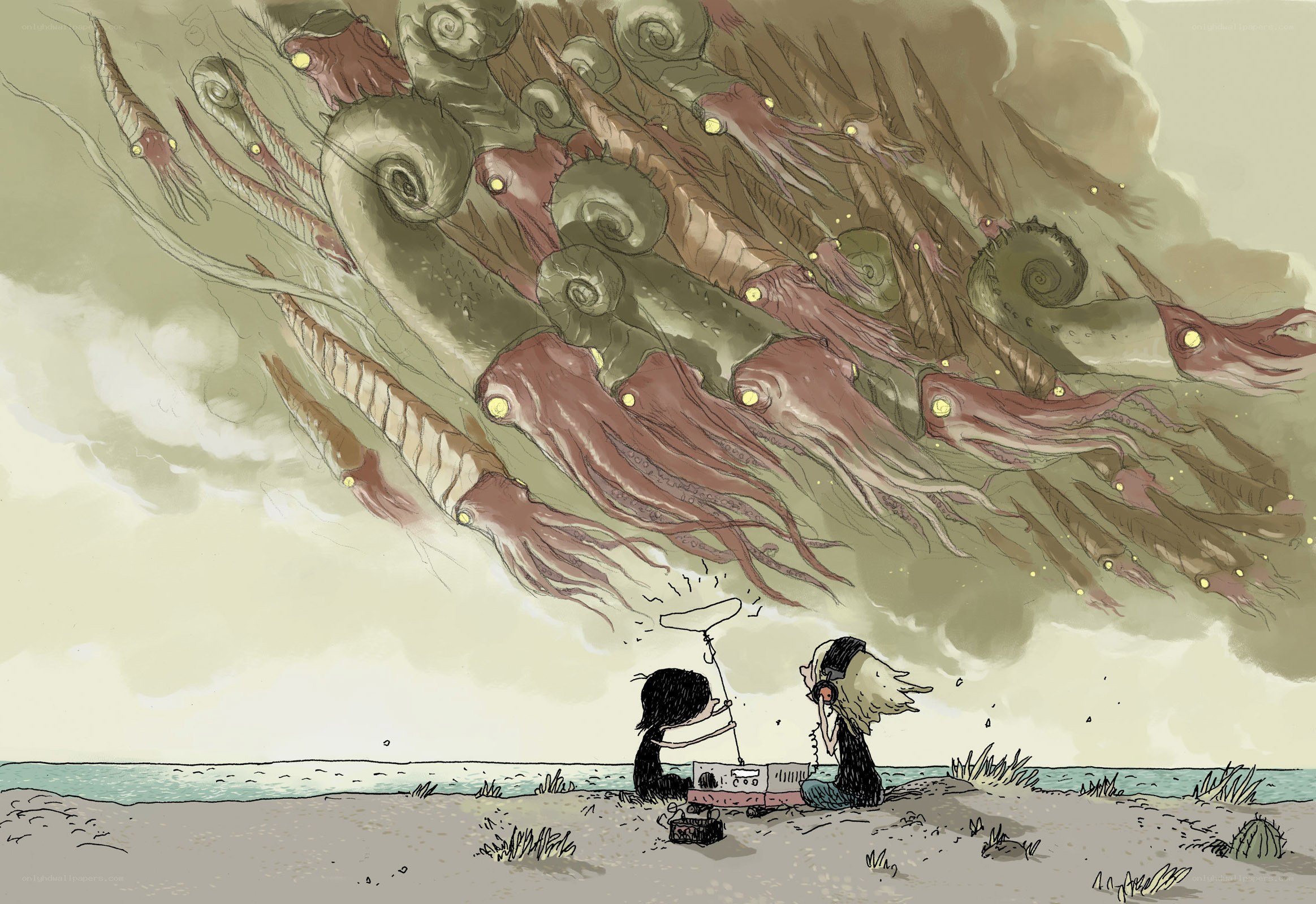 Children on beach with giant squid