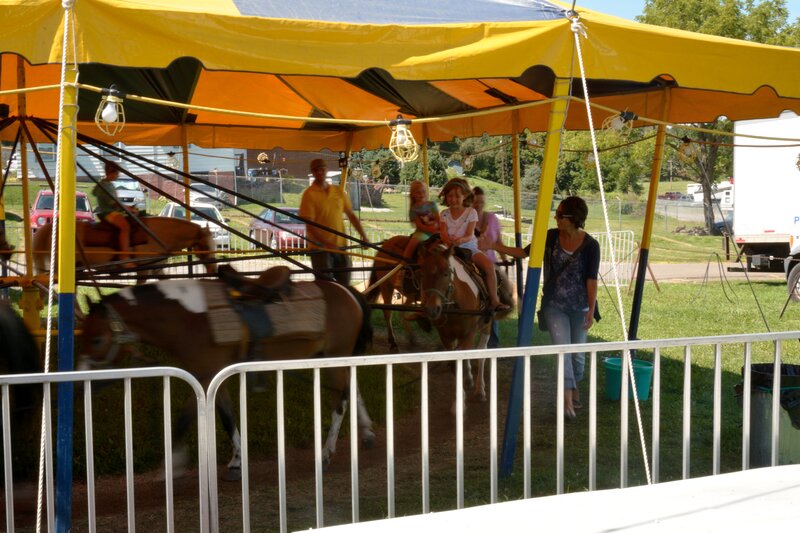 Children on Carousel Horses