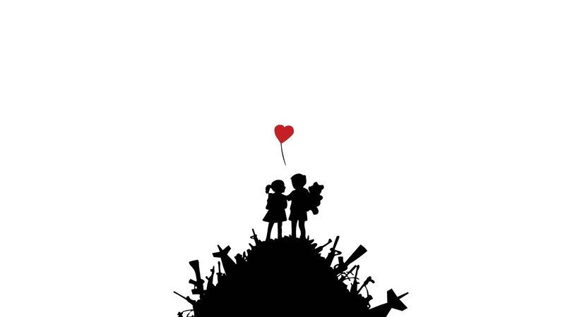 Children on Pile of Weapons