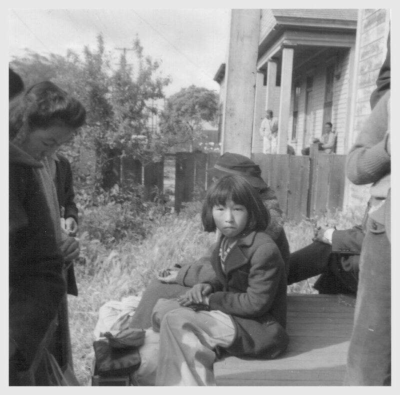 Children on porch in black and white