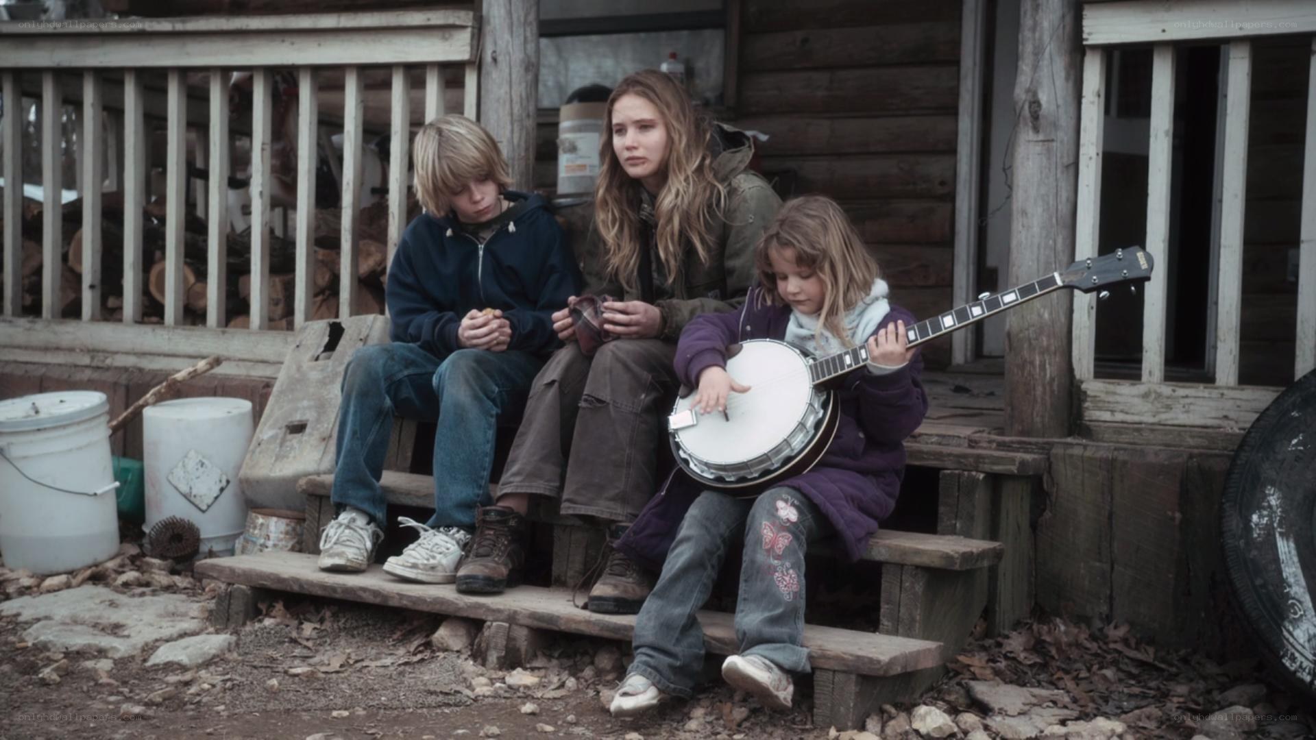 Children on porch with banjo